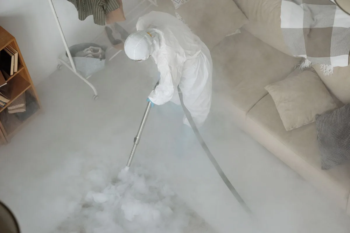 Biohazard cleanup technician in protective equipment, Riverton, UT